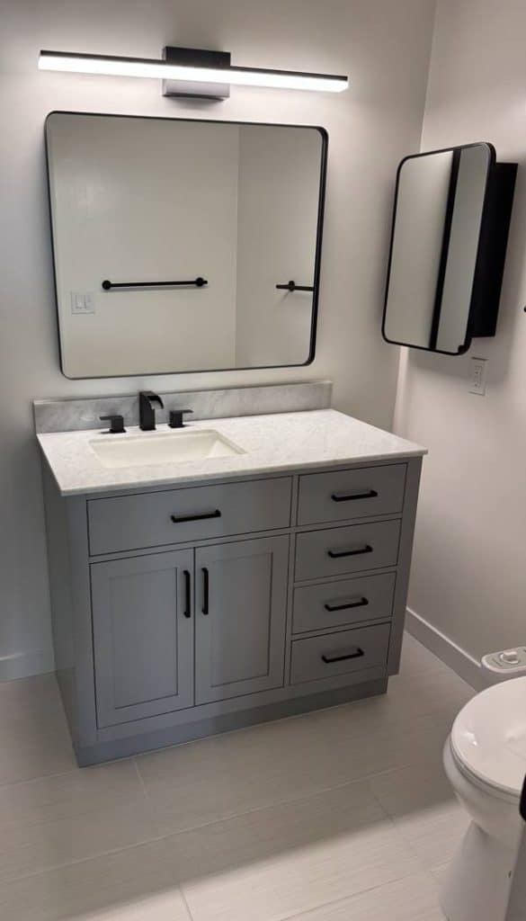 Culver City bathroom remodel - gray shaker vanity with marble top